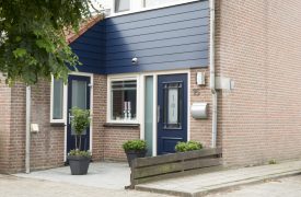 Kunststof kozijnen Nieuwegein gehele woning met voordeur en kunststof gevelbekleding