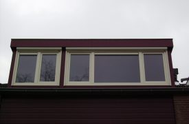 Kunststof raamkozijnen met HPL bekleding op de dakkapel