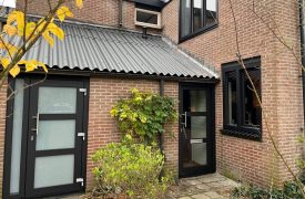 Kunststof voordeur en achterdeur als schuurdeur